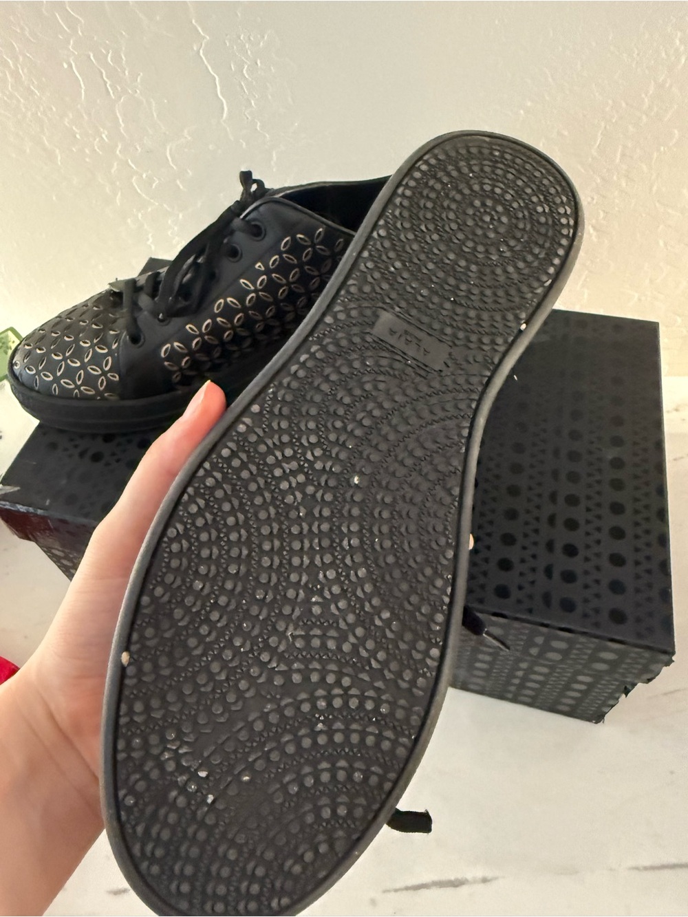 Alaia Black Leather Sneakers with Gold Cutout Pattern - Picture 2 of 3